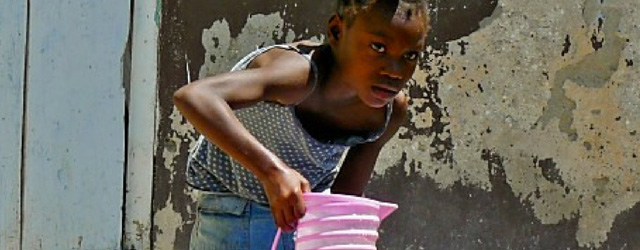 Young Haitian Girl Filling Water