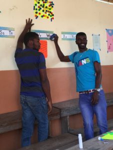 Teachers decorating classroom